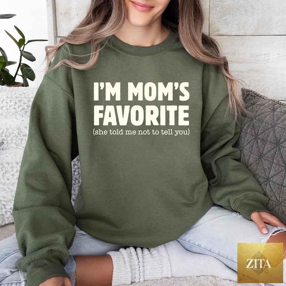 Unisex gray sweatshirt with "I'm Mom's Favorite" text, featuring humorous design for son or daughter, by Adorb Custom Tees.