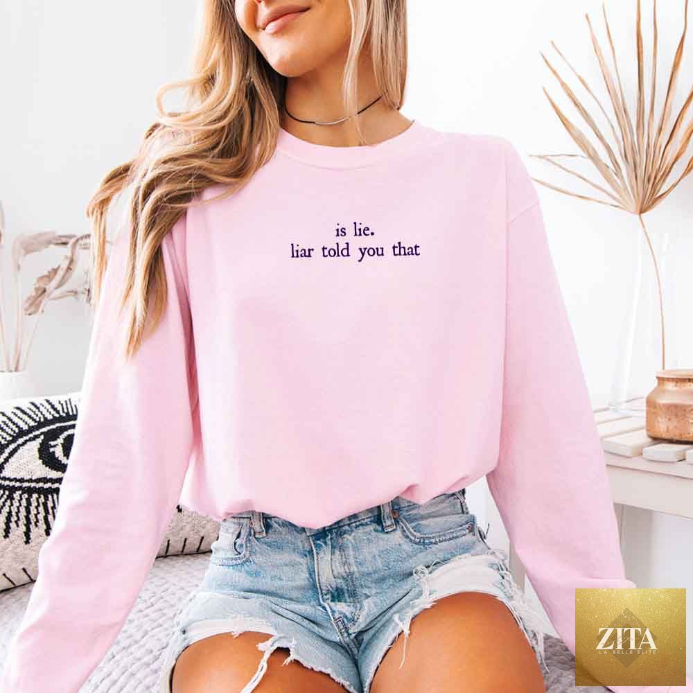 Comfort Colors long sleeve T-shirt featuring "Is Lie, Liar Told You That" text, perfect for hockey romance BookTok fans.