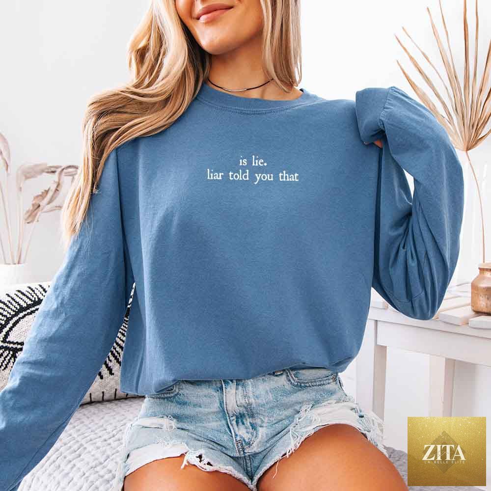 Blue Comfort Colors long sleeve T-shirt featuring "Is Lie, Liar Told You That" graphic from Adorb Custom Tees, inspired by BookTok hockey romance.