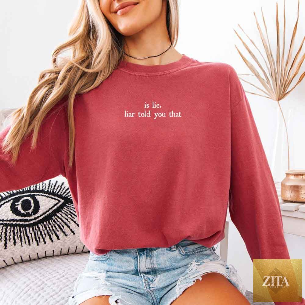 Comfort Colors long sleeve T-shirt featuring "Is Lie, Liar Told You That" design, from Adorb Custom Tees, in crimson color.