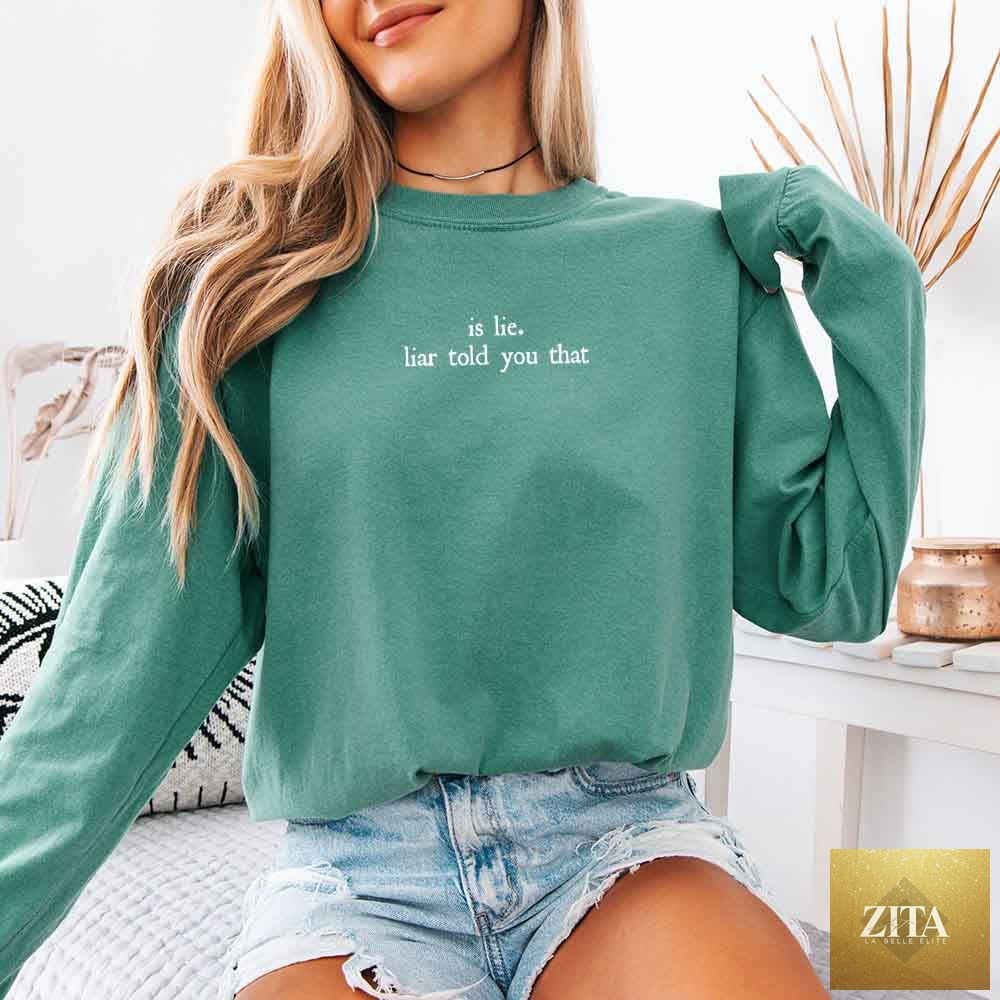 Light green Comfort Colors long sleeve T-shirt featuring the "Is Lie, Liar Told You That" Hockey Romance BookTok design by Adorb Custom Tees.