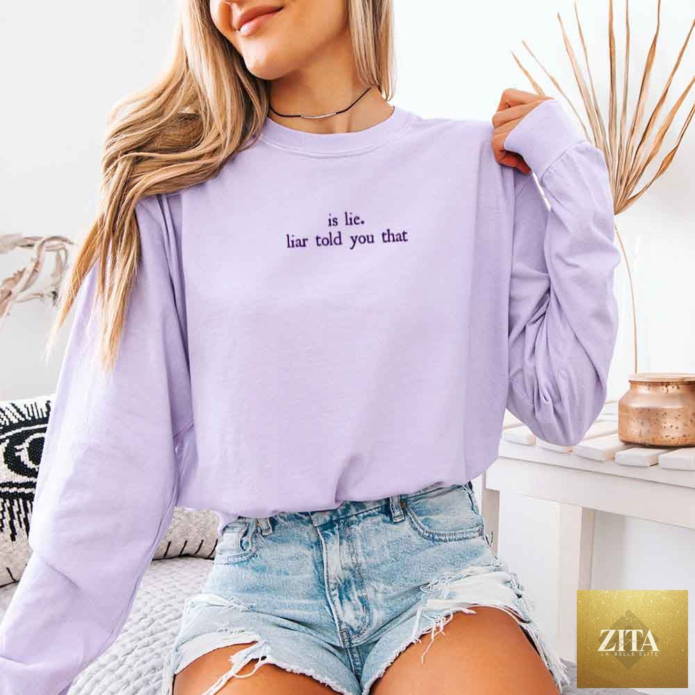 Comfort Colors long sleeve T-shirt featuring "Is Lie, Liar Told You That" hockey romance BookTok design by Adorb Custom Tees.