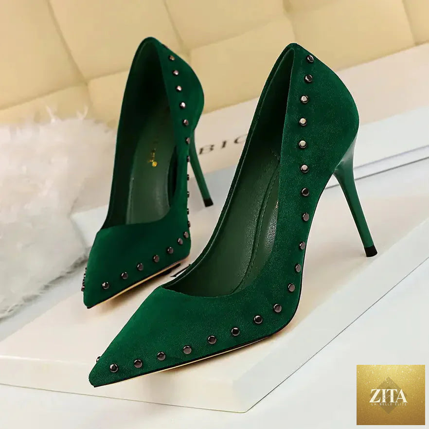 Vintage women's high heels by Trendy Attic Store01 featuring pointed toes and studded details, displayed on a neutral background.