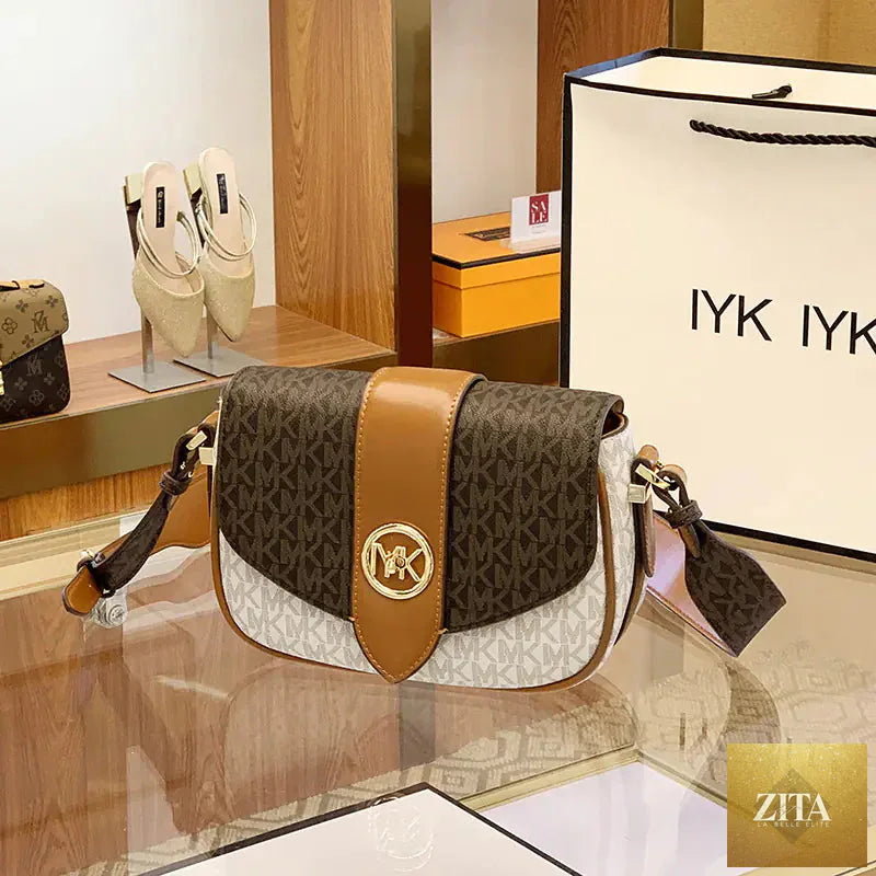 Women's leather saddle bag purse from Trendy Attic Store01, featuring a stylish design with adjustable strap and elegant finish.