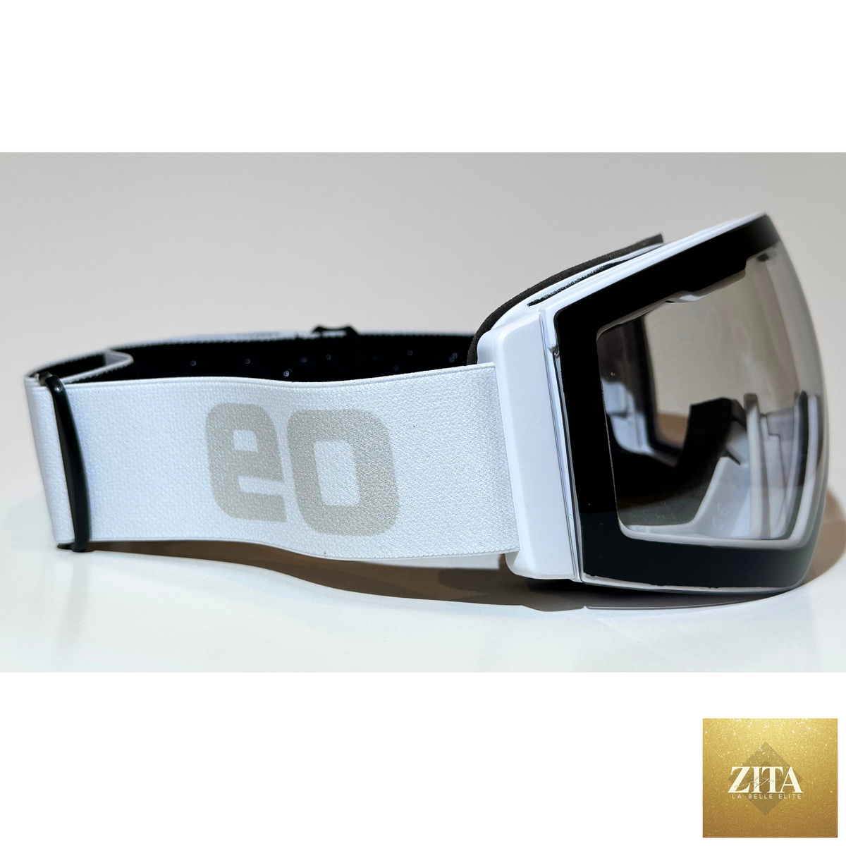 Eastern Outer MACH SCHNELL MAG photochromic ski and snowboard goggles with clear side lenses for versatile outdoor winter sports.