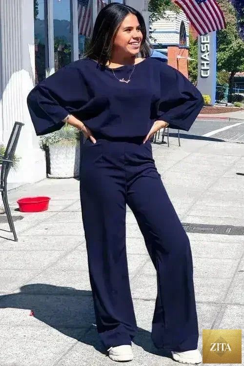Femstylo bracelet sleeve jumpsuit with waist tie and wide-leg design, perfect for day to night casual or dressy occasions.