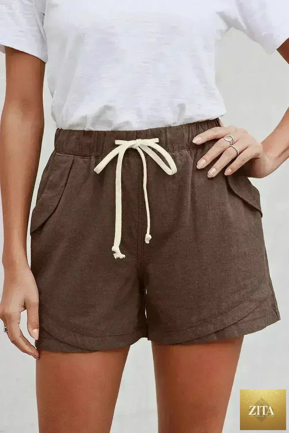 Women’s casual khaki Faylin linen shorts by Femstylo, featuring a relaxed fit and breathable fabric for summer wear.