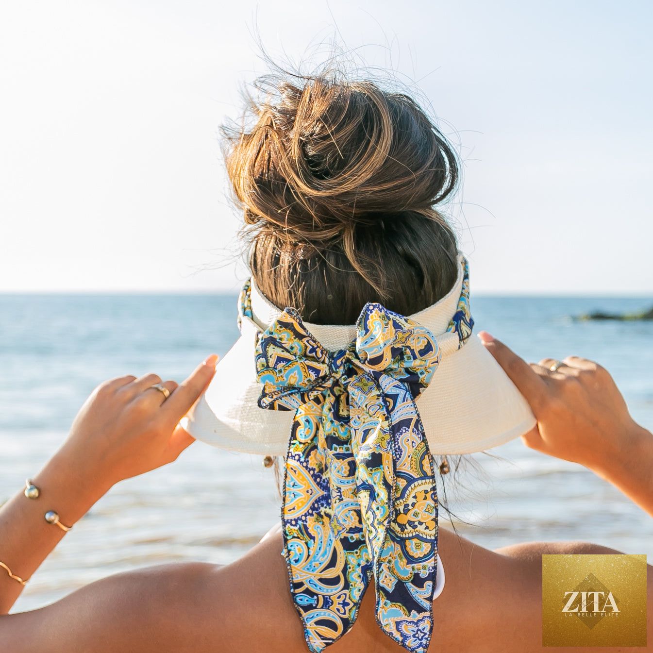 Aili's Corner sun visor with a stylish scarf accent, lightweight and breathable for sun protection and fashion.