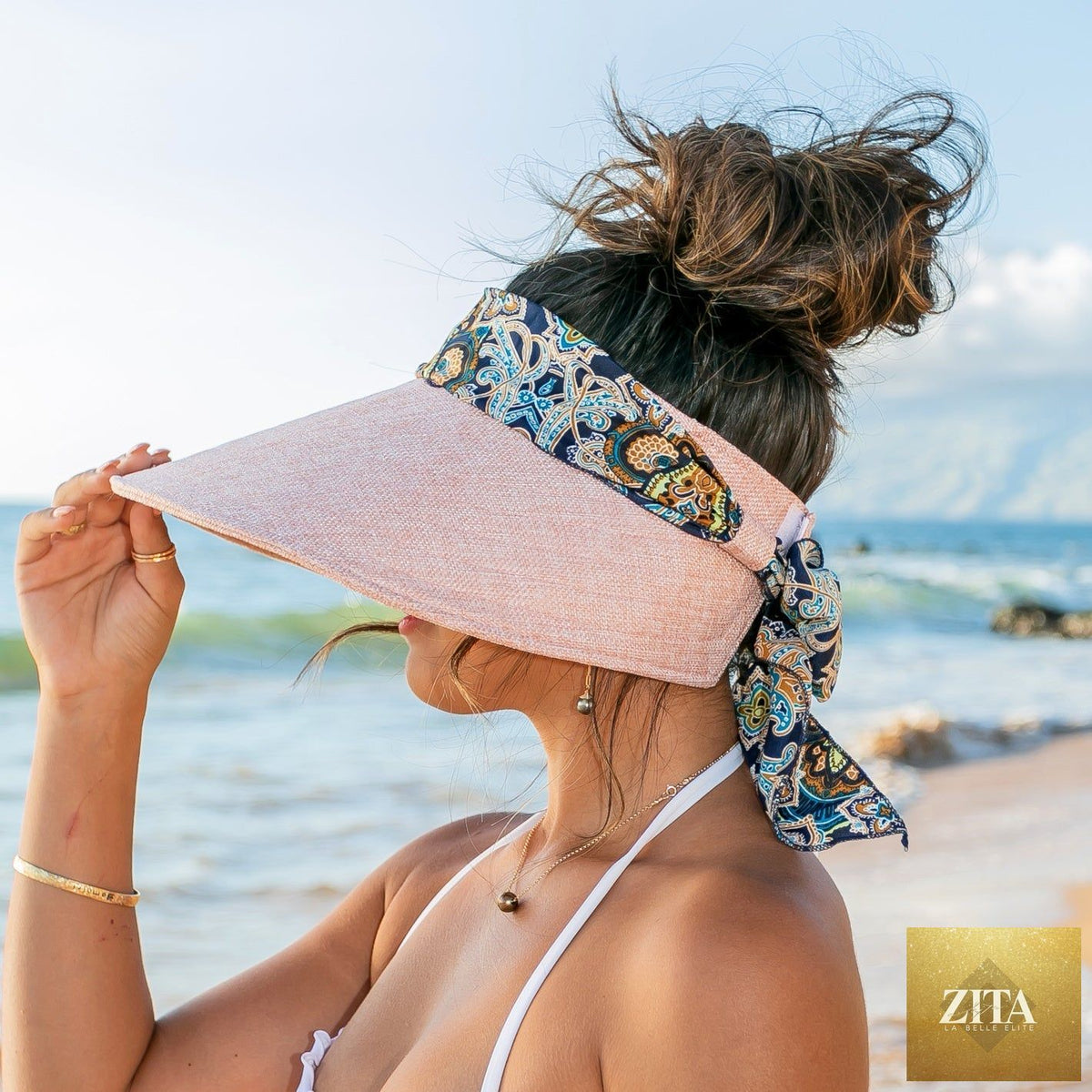 Aili's Corner sun visor with a stylish scarf accent, featuring a wide brim and lightweight design for sun protection.
