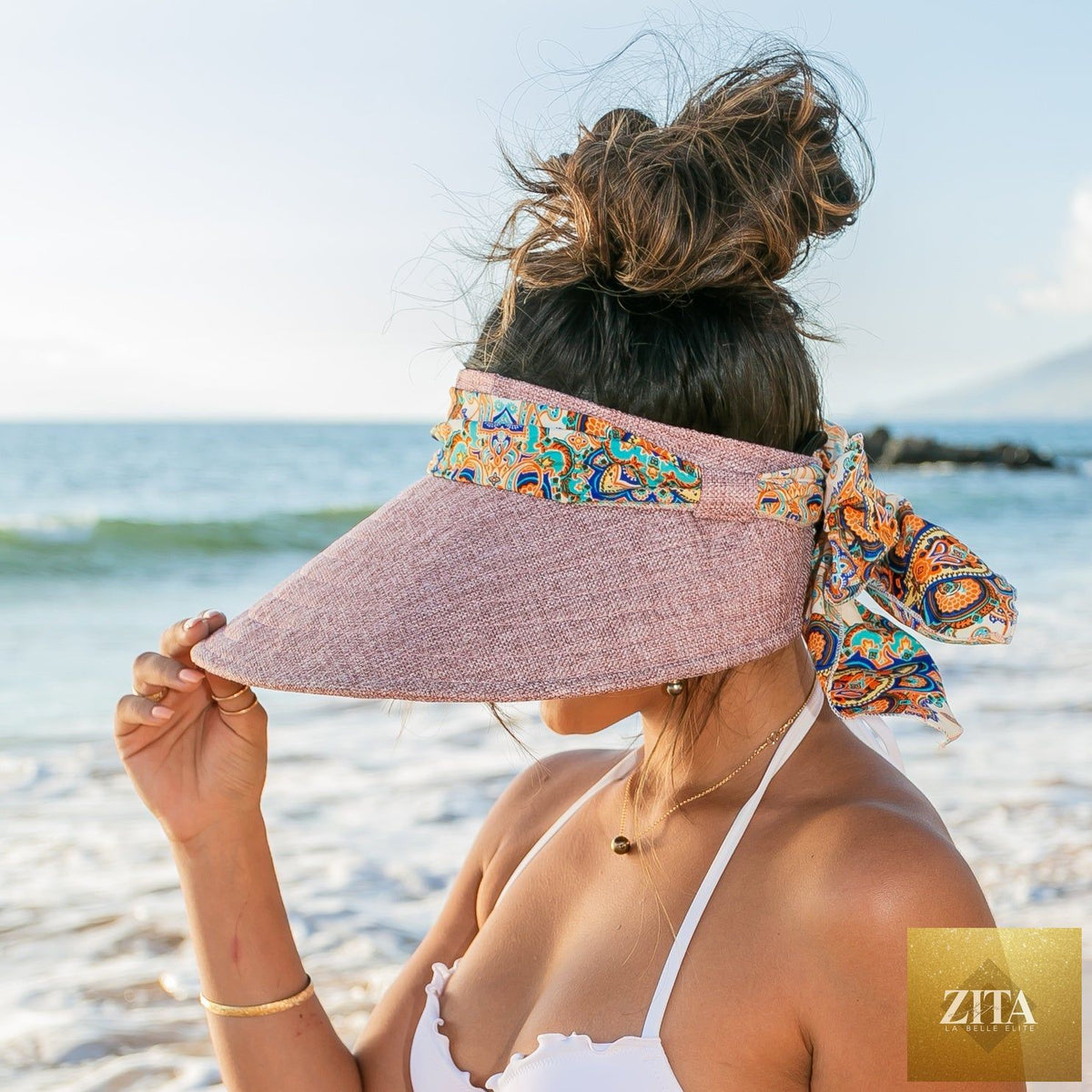 Aili's Corner sun visor with a stylish scarf accent, featuring a wide brim and lightweight design for sun protection.