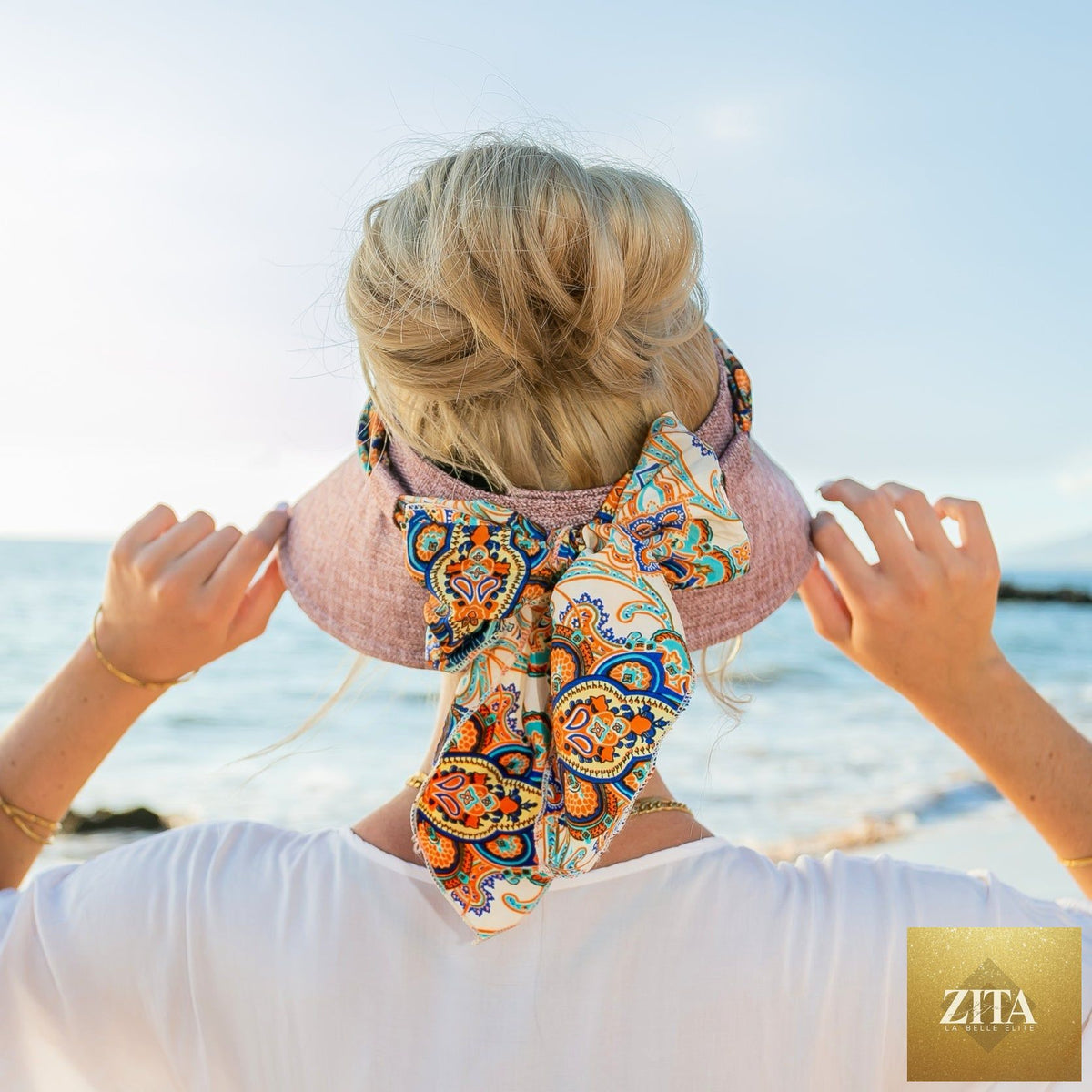 Aili's Corner sun visor with a stylish scarf accent, lightweight and perfect for sun protection and fashionable outdoor wear.