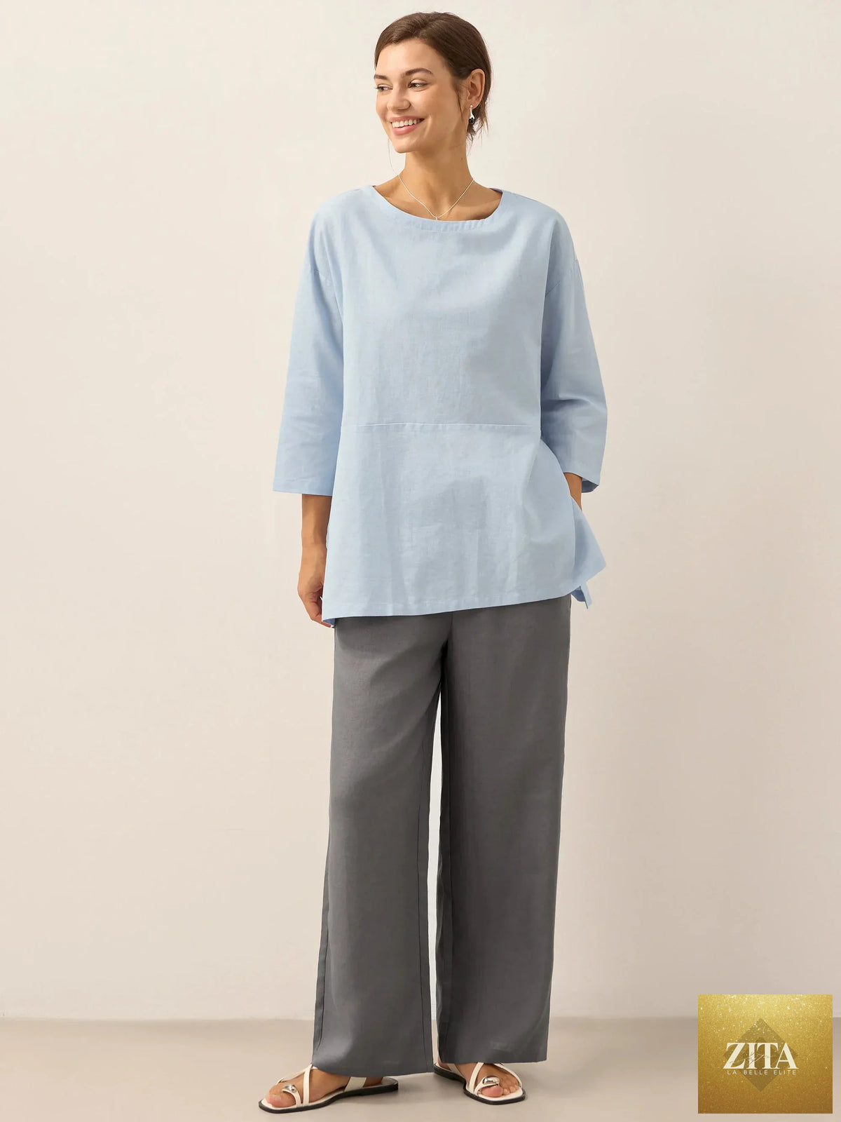 LINTICO linen white boat neck oversized top for women, made of linen blend, with relaxed fit and long sleeves.