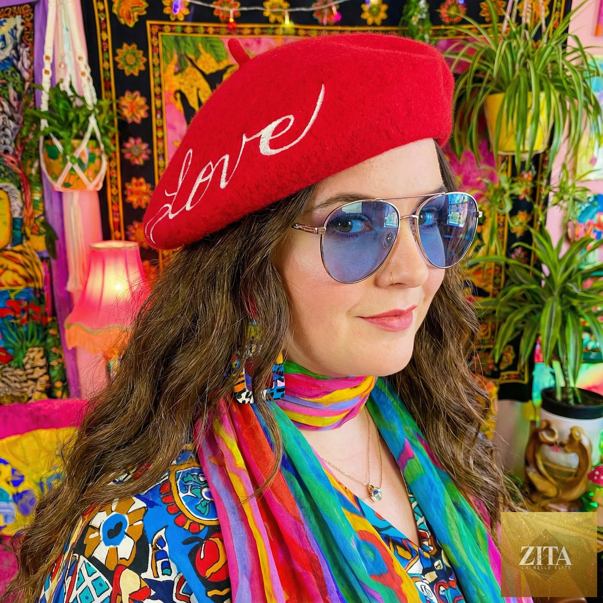 Red love-embroidered beret hat from The Bullish Store, featuring a stylish and cozy accessory with embroidered love detail.