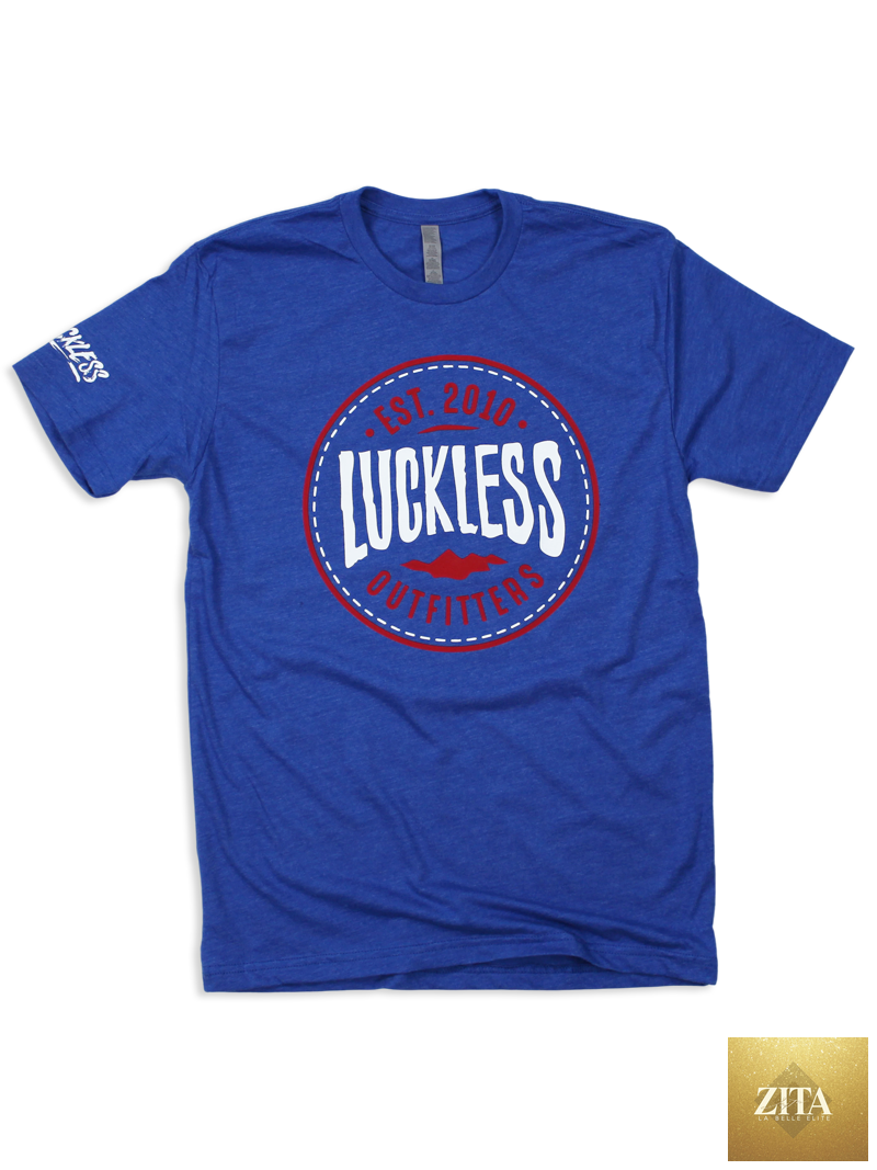 Luckyless Outfitters Americana Mountain Logo Tee featuring a front graphic of the brand's mountain logo on a casual t-shirt.