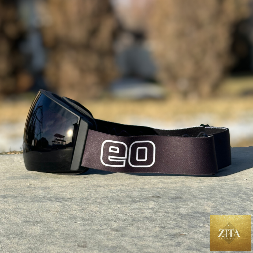Eastern Outer MACH SCHNELL MAG photochromic ski and snowboard goggles in black, featuring a dark profile lens for versatile visibility
