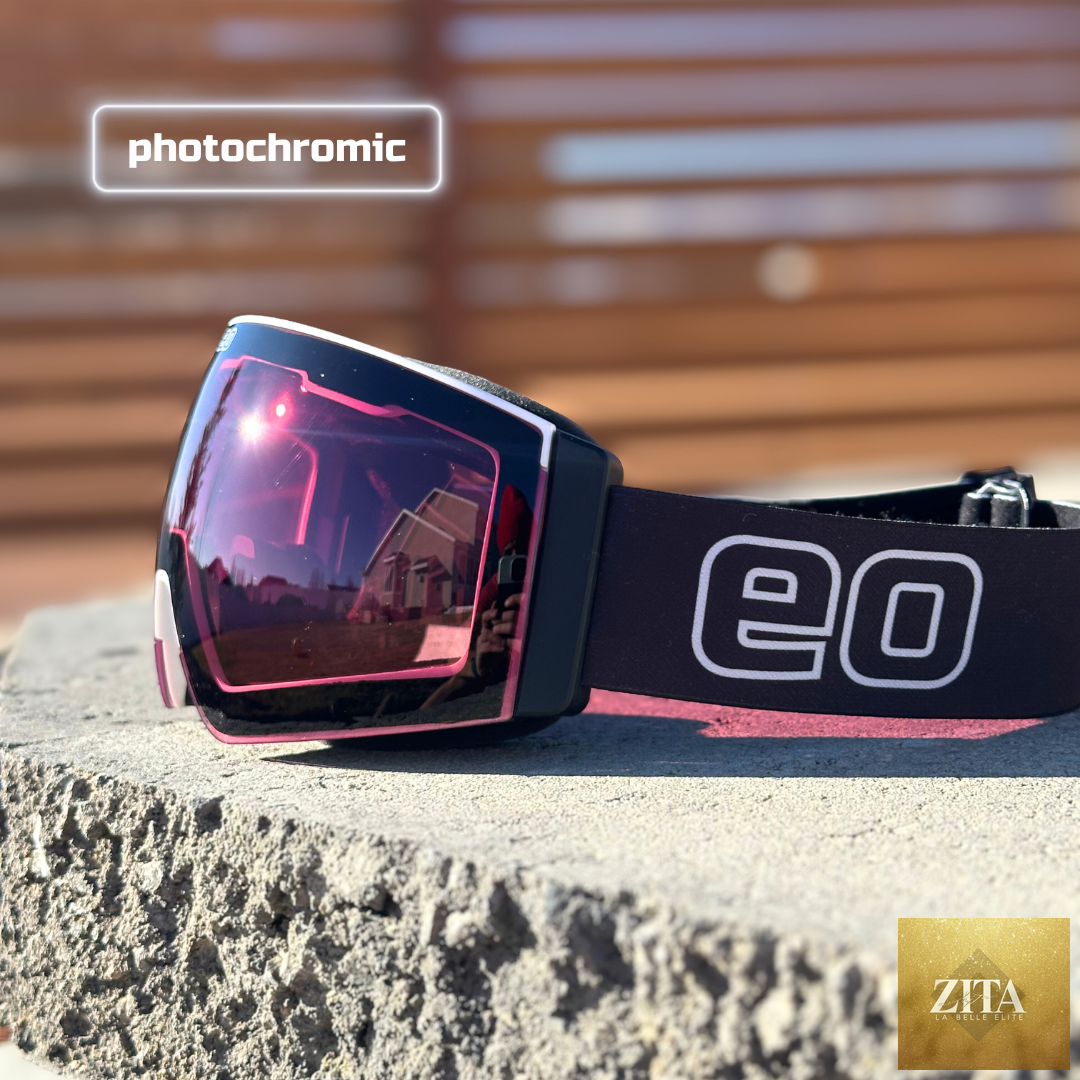 Eastern Outer Mach Schnell Mag photochromic ski and snowboard goggles with black frame and rose-tinted lenses, angled view.
