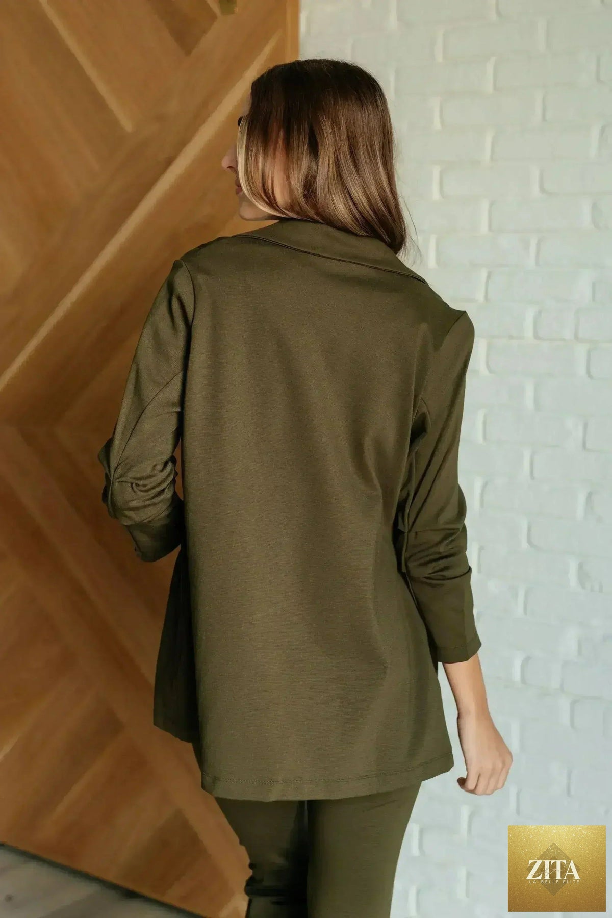 Femstylo women's Magic 3/4 blazer in olive, showcasing tailored fit and stylish 3/4 length sleeves.