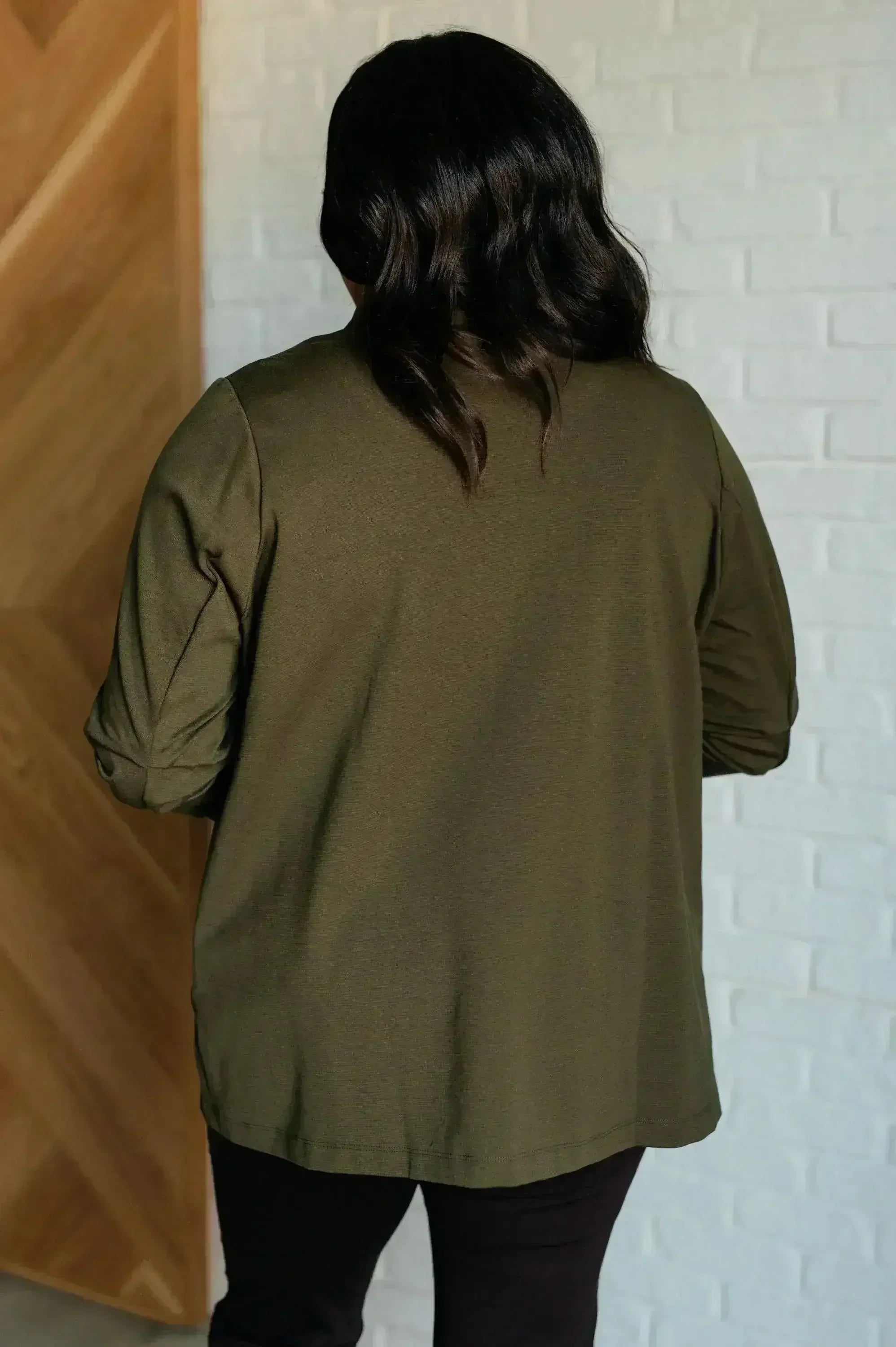 Femstylo women's Magic 3/4 blazer in olive, tailored fit with lapels and long sleeves, styled on a hanger.