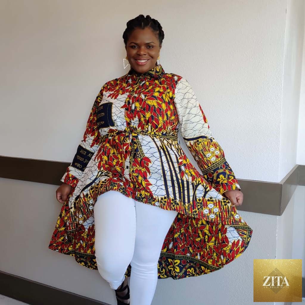 Duma Mbili LLC Kente African print high low button-up shirt in white and red honey, featuring vibrant traditional patterns.