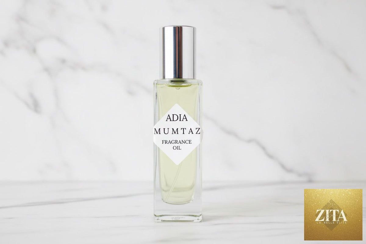 Zita La Belle Elite Mumtaz Natural Fragrance Oil in a clear glass bottle with a dropper, showcasing a luxurious aromatic scent.