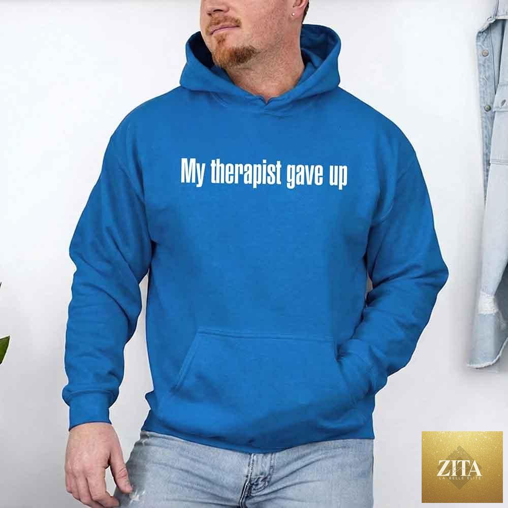 Black hoodie with humorous text "My Therapist Gave Up" from Adorb Custom Tees, featuring a casual, comfortable fit.
