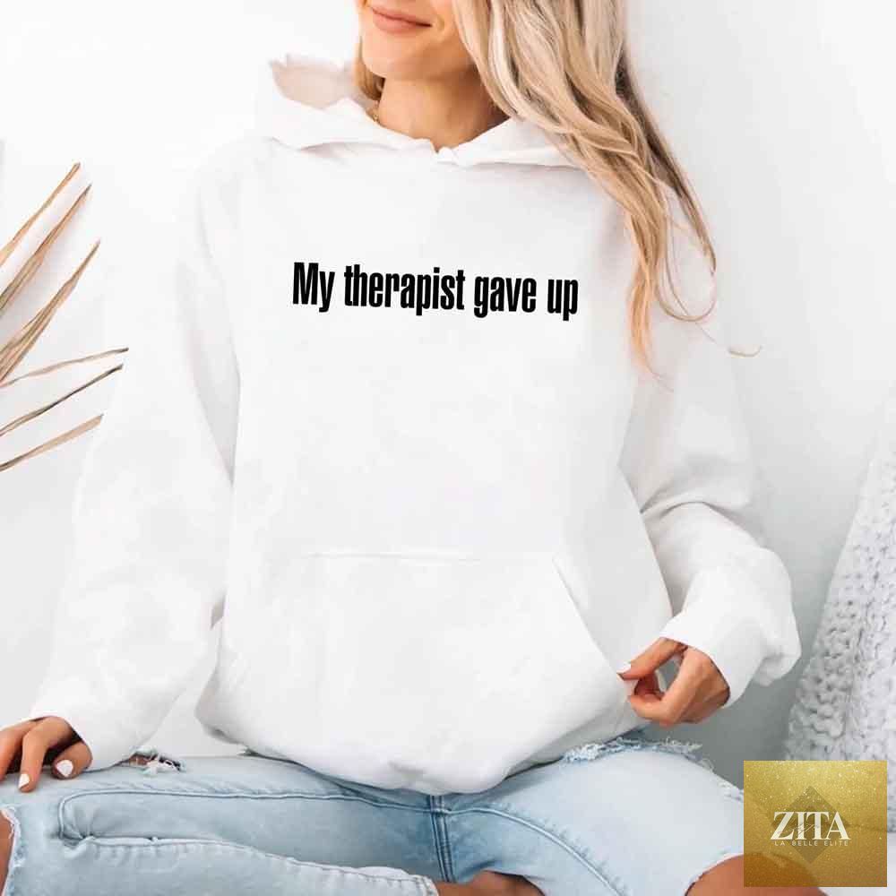 Funny sarcastic humor hoodie featuring the phrase "My Therapist Gave Up," by Adorb Custom Tees, shown in a casual hoodie style.