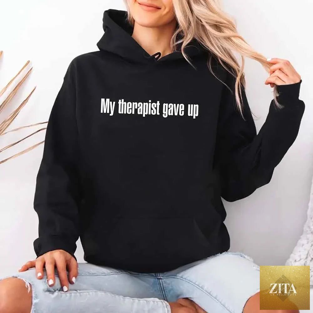 Gray hoodie featuring humorous text "My Therapist Gave Up" from Adorb Custom Tees, casual and comfortable apparel.