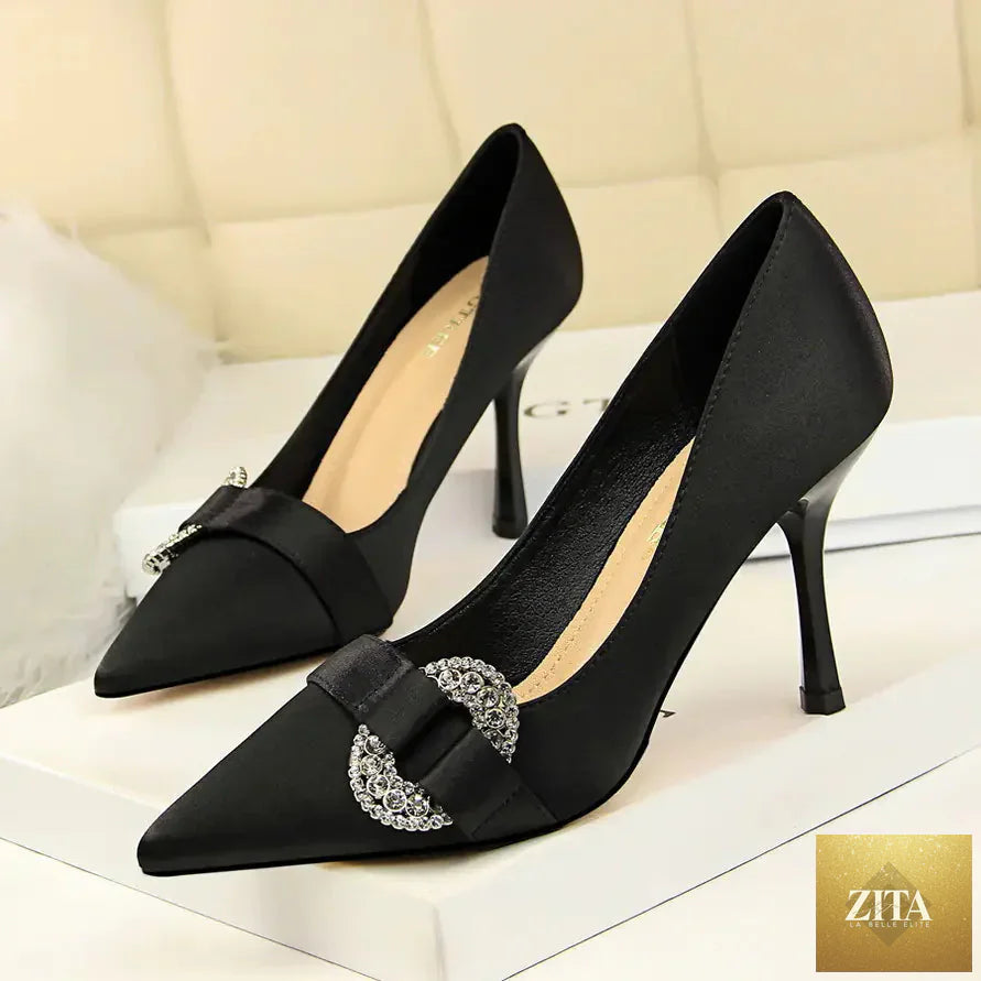 Elegant satin pointed toe high heel shoes for women with rhinestone buckle detail, perfect for formal occasions.