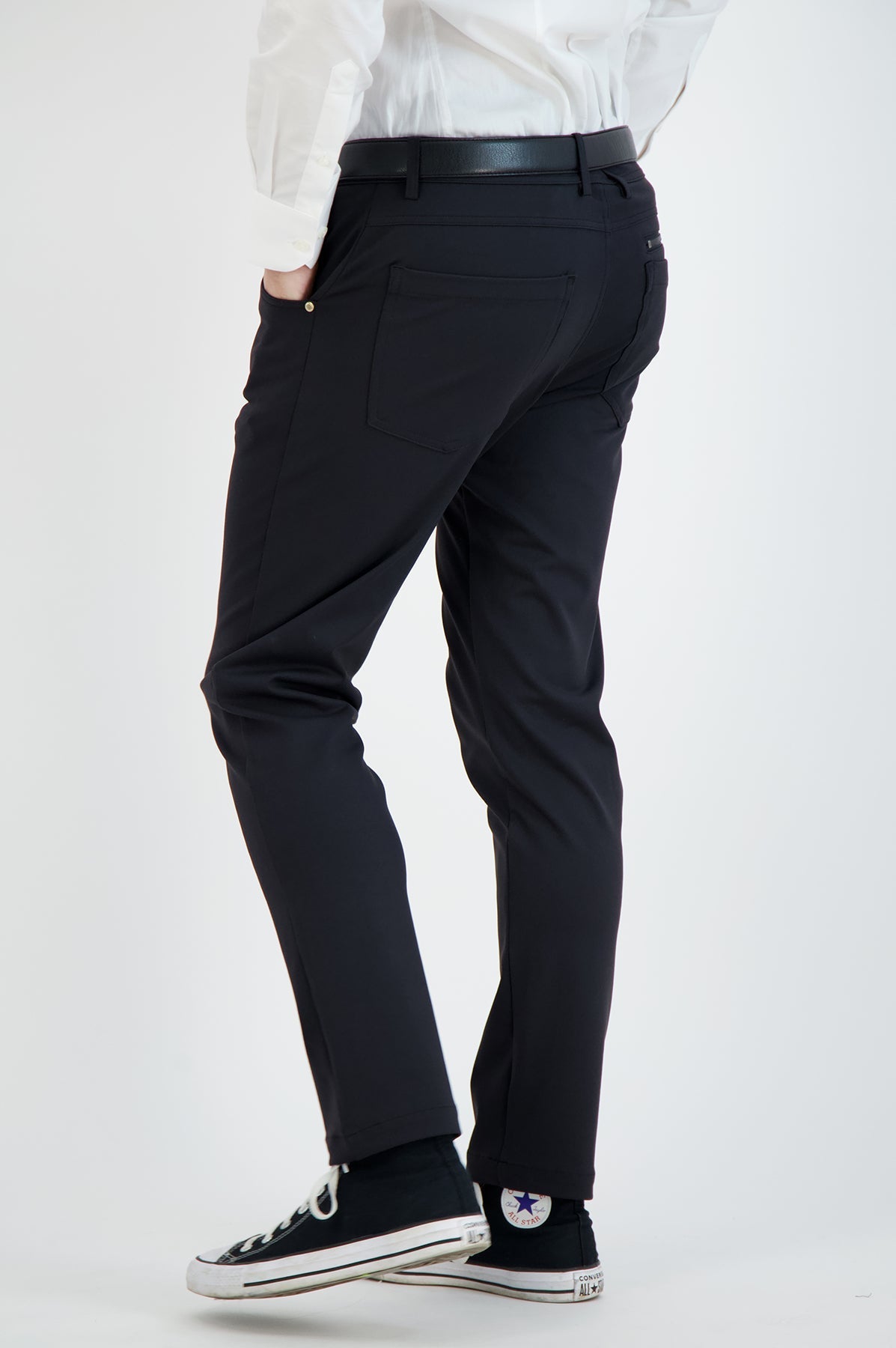 Black men's casual stretch chinos by LEVINAS® Official from the Performance Collection, showing the fit and fabric texture.
