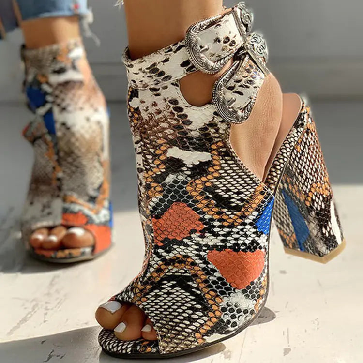 Pair of large women's sandals with high thick heels from Trendy Attic Store01, featuring stylish design and open toe style.