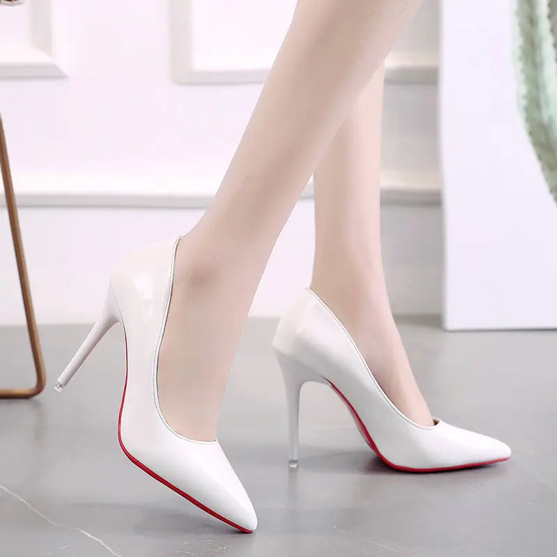 Women's pointed toe high heels from Trendy Attic Store01, stylish black women shoes with sleek design and stiletto heels.
