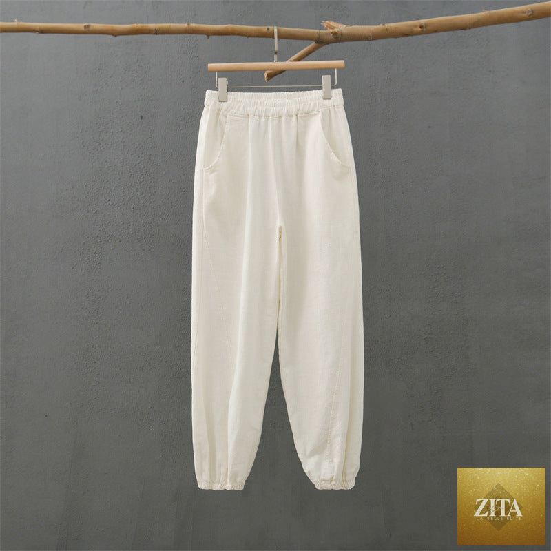 Cotton linen women’s casual trousers with retro stone washed look, bamboo section, suitable for spring and summer wear.
