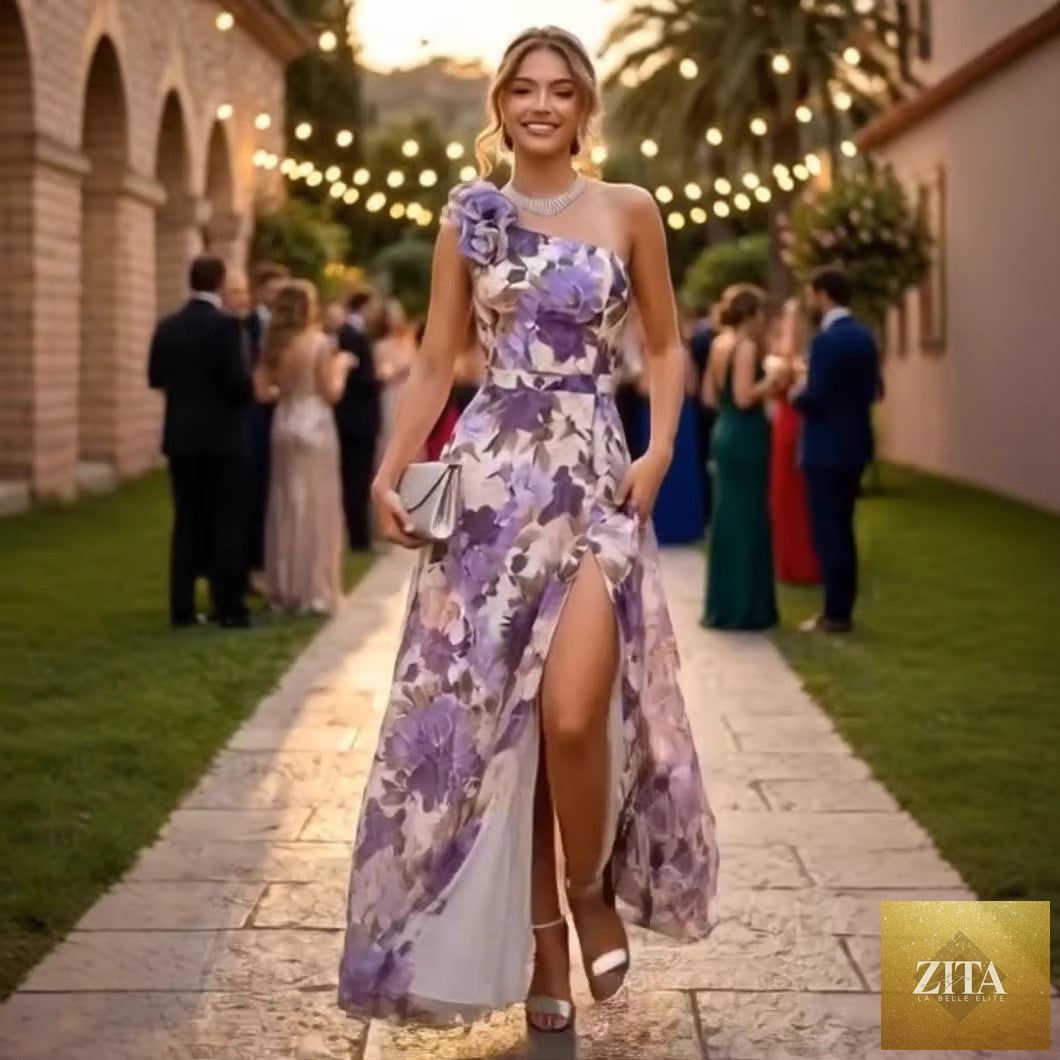 Bella Mia summer maxi dress with floral print, slimming waist, slant shoulder design, and slit, perfect for warm weather.