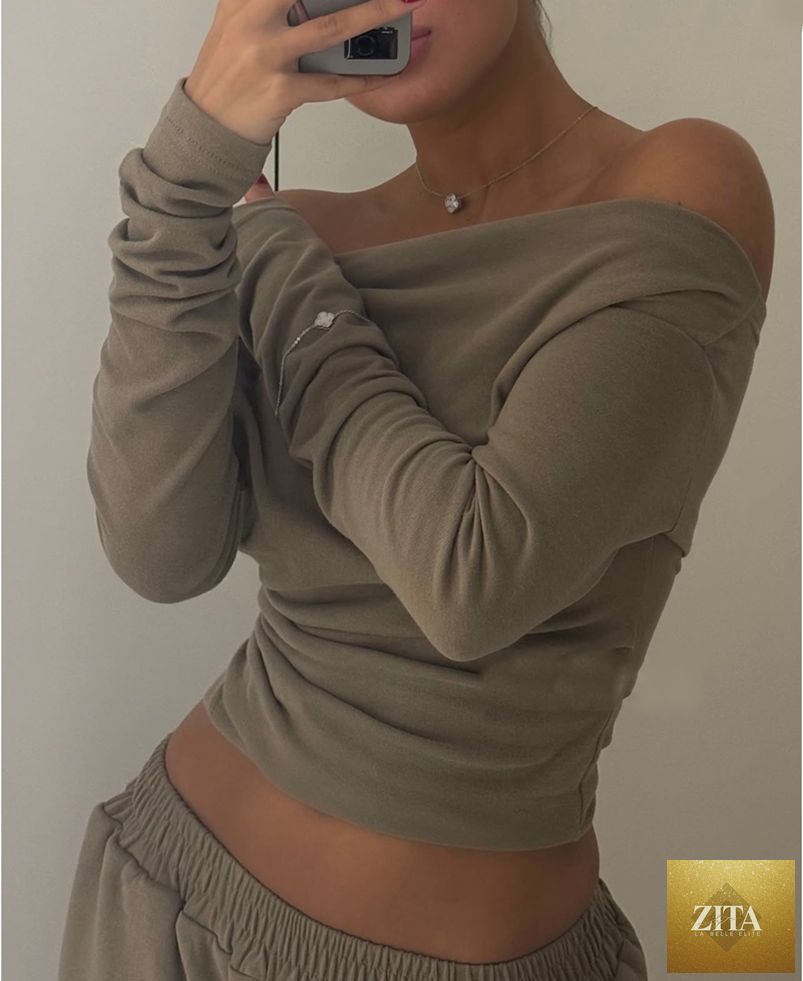 Fall off neck asymmetric hem long T-shirt and straight-leg trousers casual two-piece set by Wanita Store, shown in a relaxed fit.