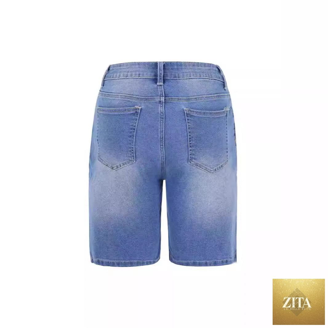 Women slim denim middle shorts with a mid-rise fit, featuring classic blue wash and clean hem, from Wanita Store.