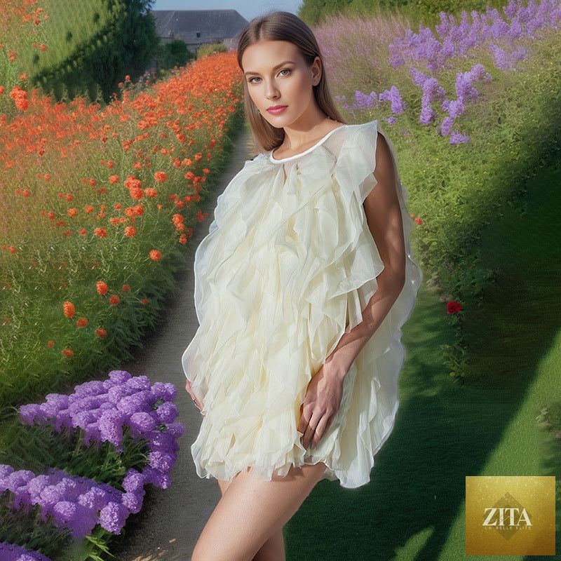 See-through organza sleeveless dress with irregular asymmetric ruffles and stitching, designed for women by Zita La Belle Elite.