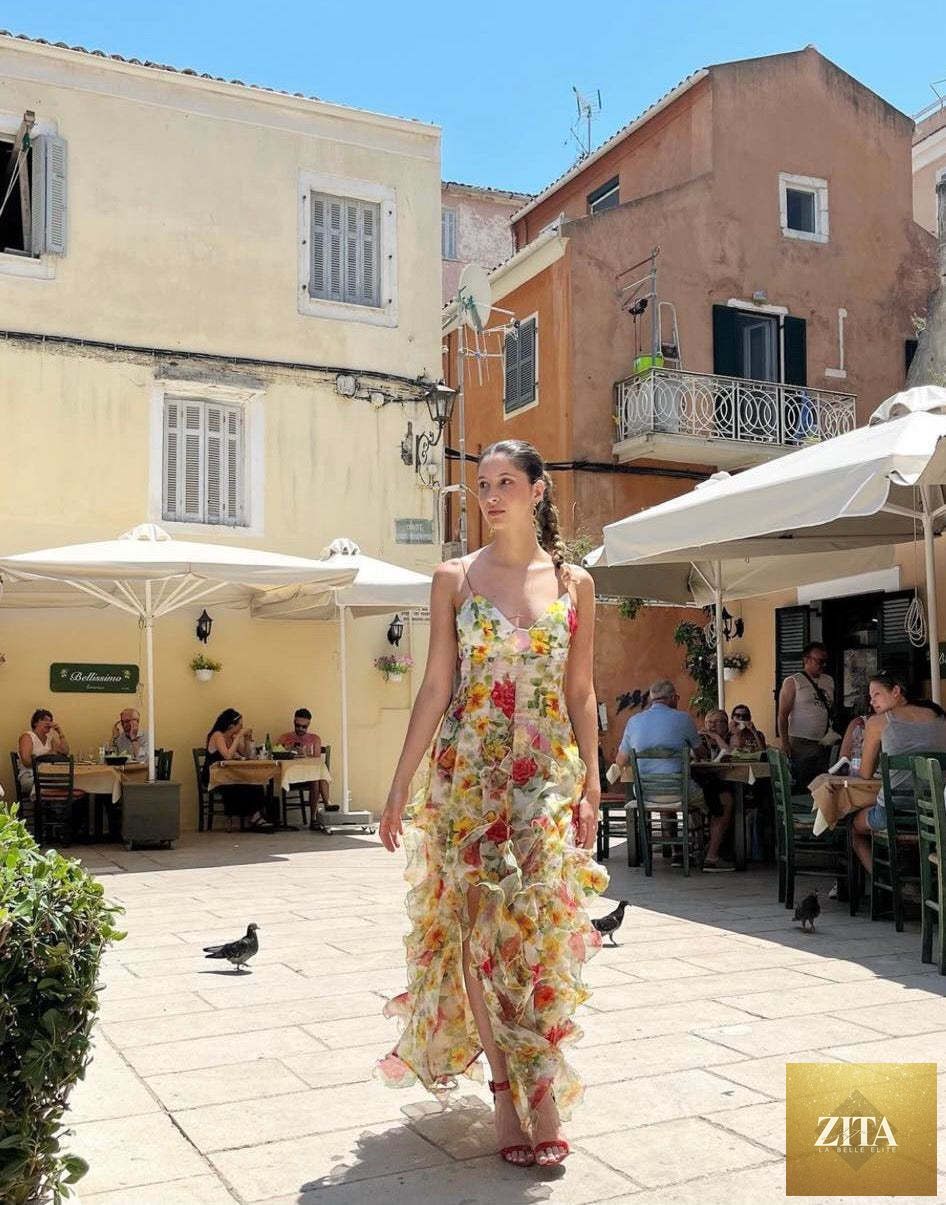 Elegant off-the-shoulder chiffon evening gown for women featuring a printed ethereal design and long flowing silhouette.