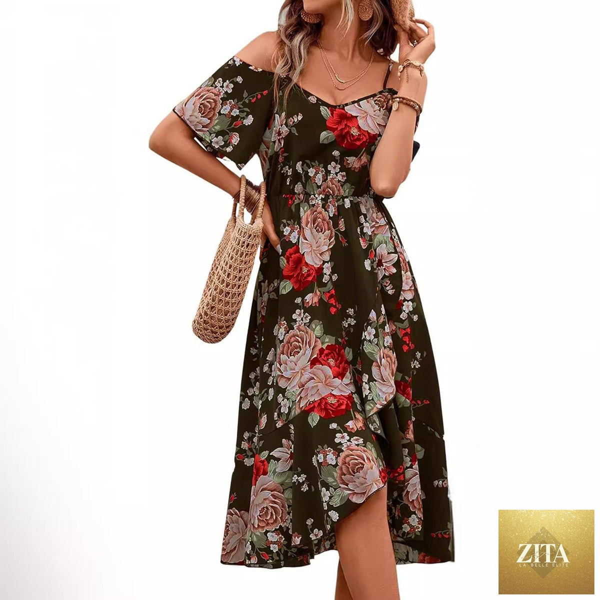 Women's bohemian printed spaghetti strap dress by SHOMICOBOUTIQUE featuring artistic floral patterns and flowing fabric.
