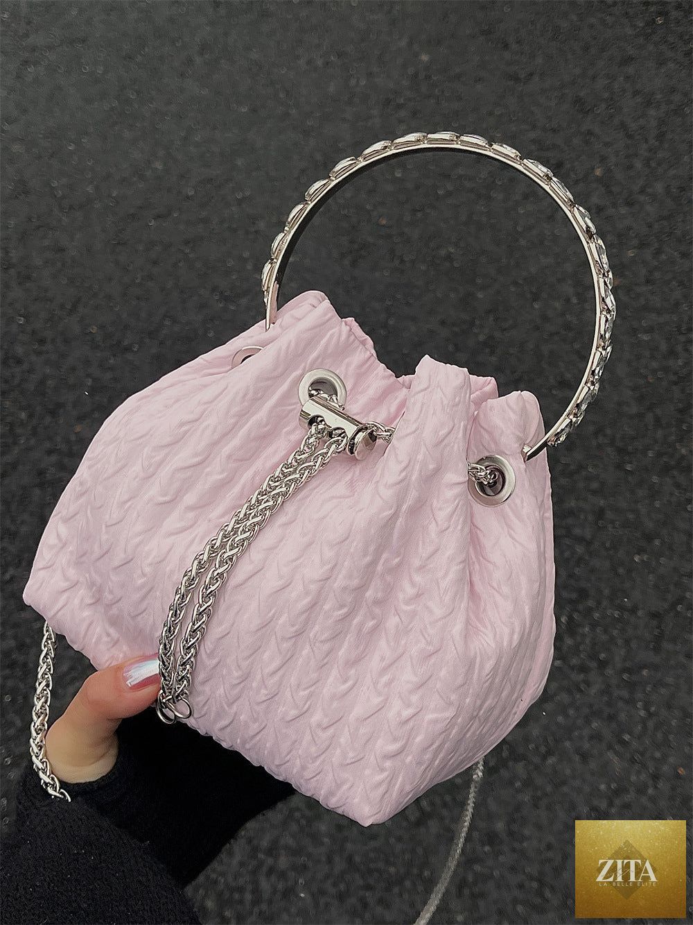 Nude luxury women's evening bag with rhinestone chain, drawstring bucket style, suitable for parties and special occasions.