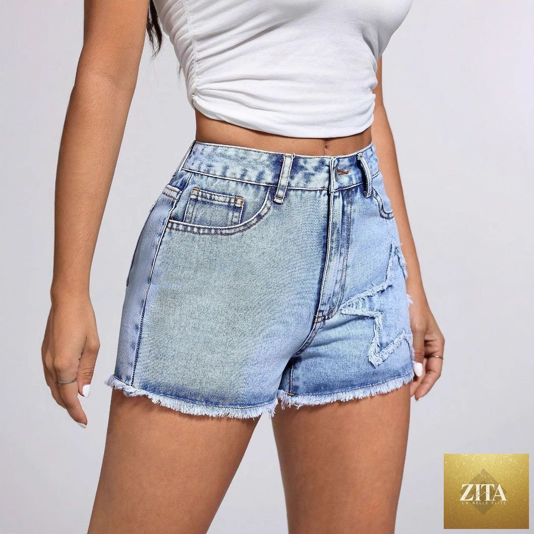 Women's casual fashionable frayed hem denim shorts by Wanita Store, showcasing a stylish and relaxed fit.