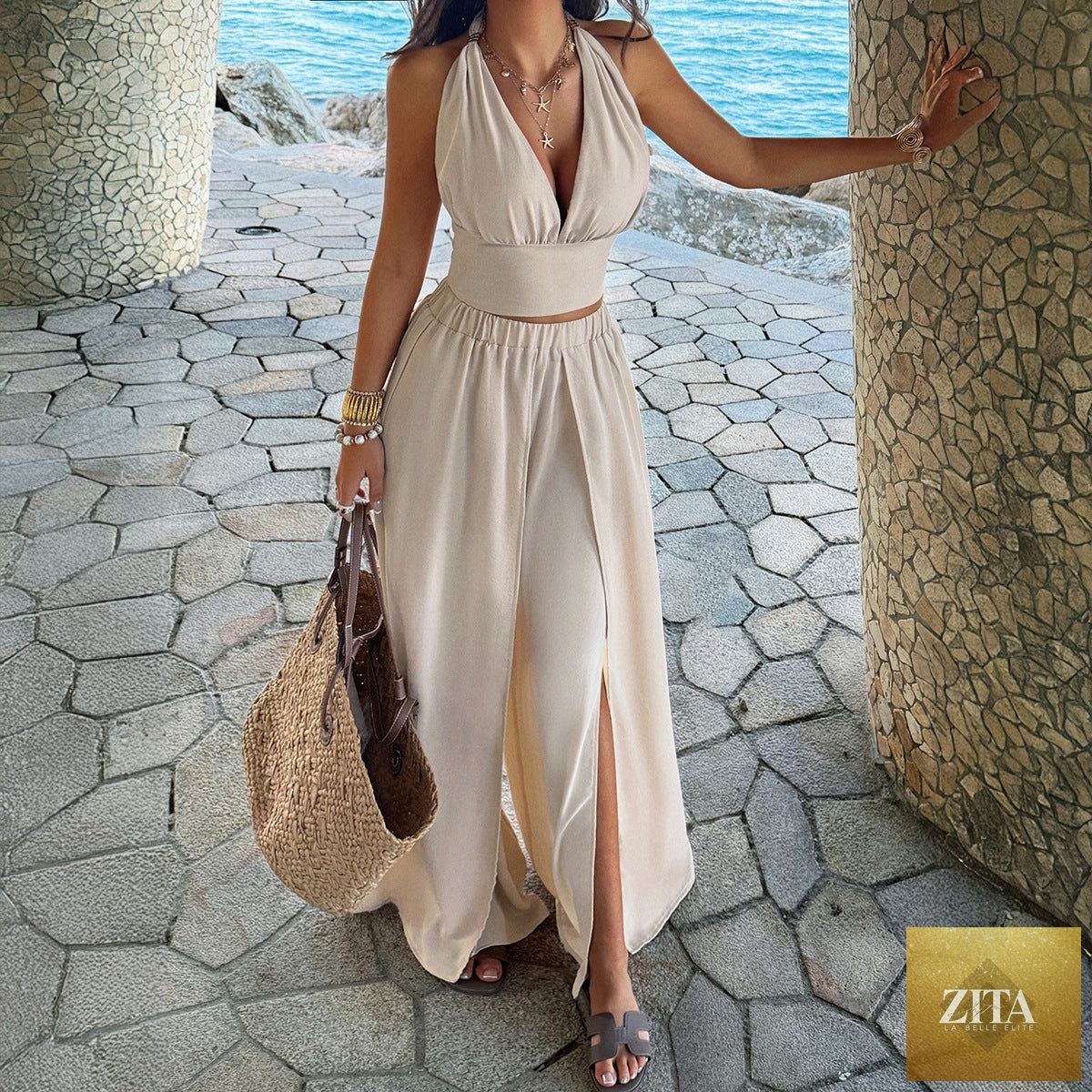 Elegant spring summer holiday top and culottes two-piece set from Wanita Store, featuring light, stylish fabric and relaxed fit.