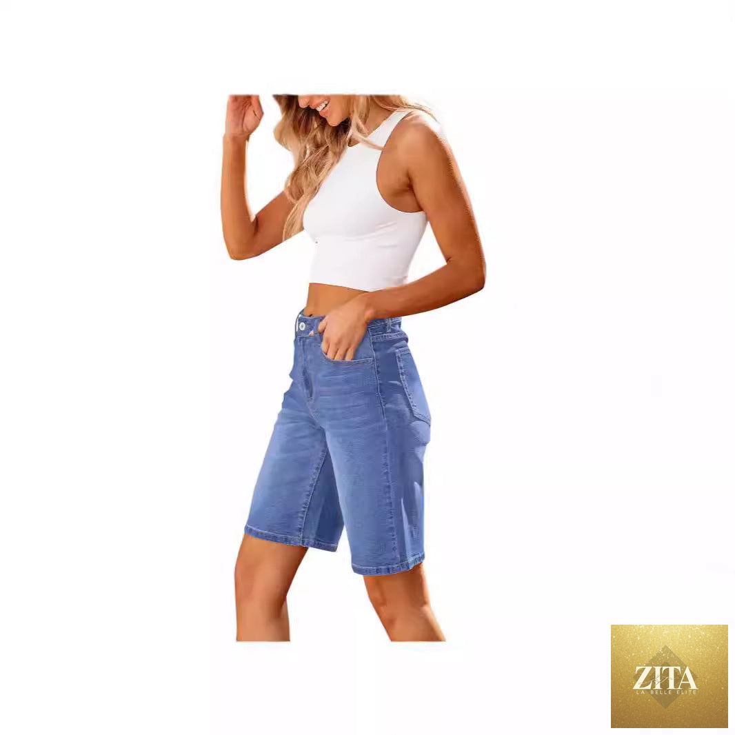 Women slim denim middle shorts shown in the image, featuring a fitted design and classic blue wash from Wanita Store.