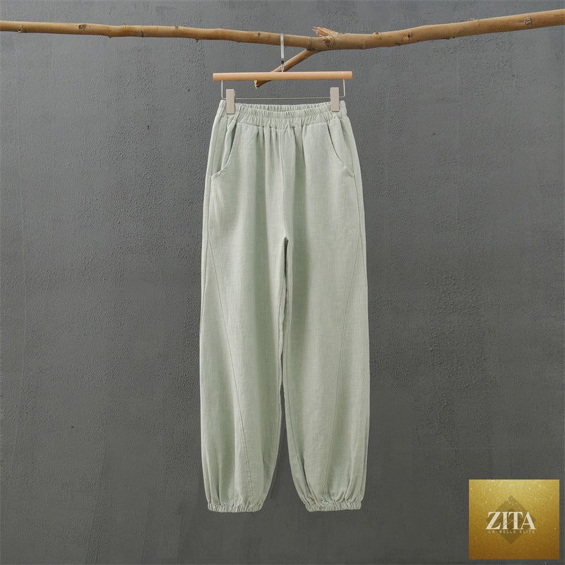 Light cotton linen women’s casual trousers with stone washed finish, featuring a relaxed fit and bamboo section for spring summer wear.