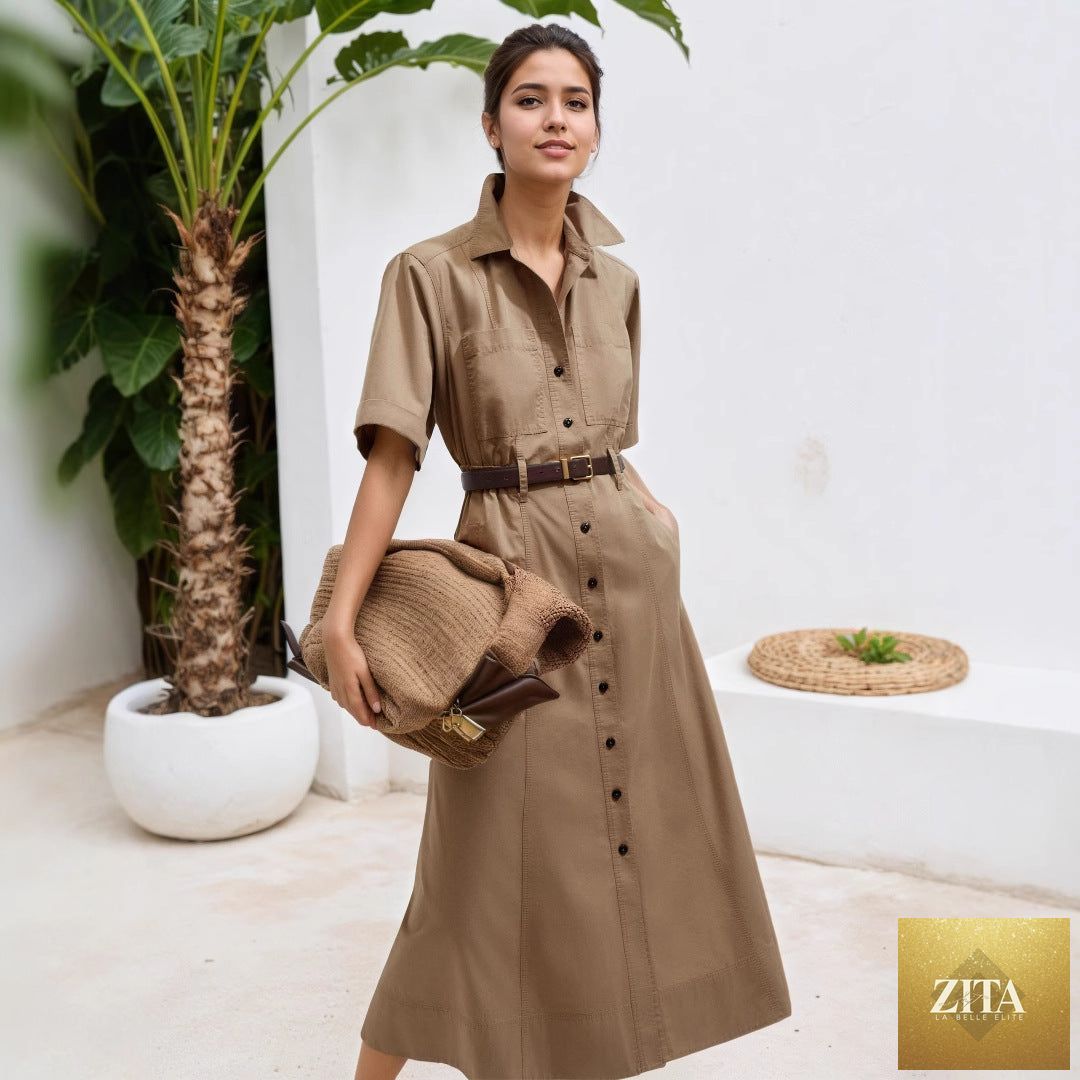 Women’s khaki shirt dress by Ragazza featuring short sleeves, a collared neckline, waistbelt, and decorative button details.