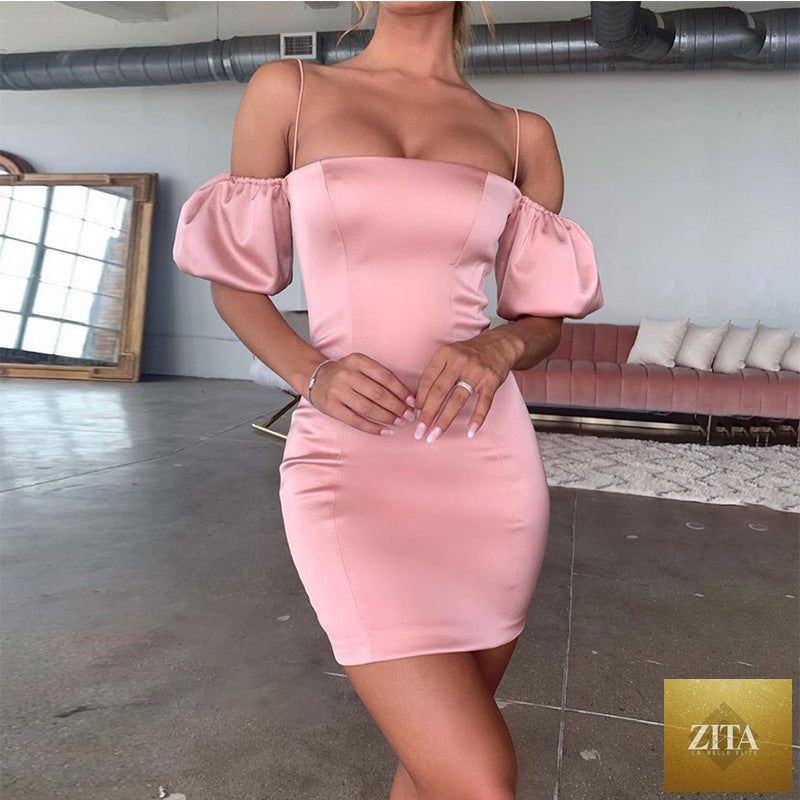 Women's satin bodycon mini dress by SHOMICOBOUTIQUE featuring a sleeveless, backless, wrap design for cocktail parties.