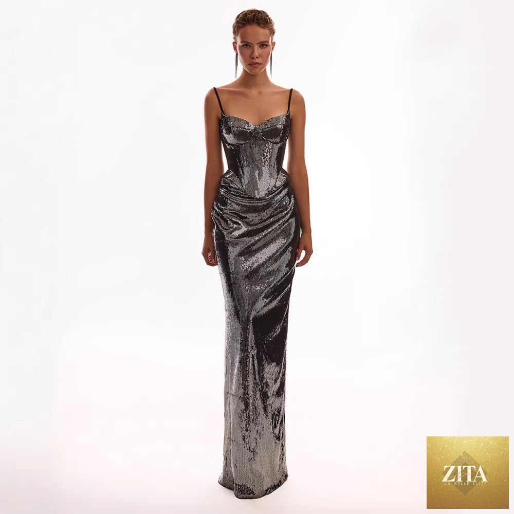 Women sleeveless sequin sling dress with backless lace-up design and sexy sheath skirt by Zita La Belle Elite.