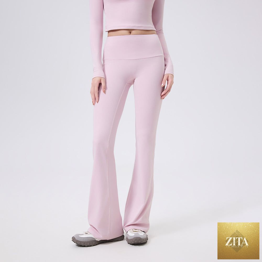 Wide brimmed bell bottom yoga pants for women, low waist, slimming fit, workout trousers from Wanita Store.