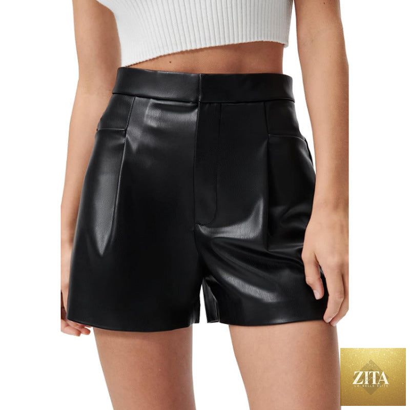 Women’s high waist faux leather shorts with belt and pocket detail, casual yet sexy, from Wanita Store.