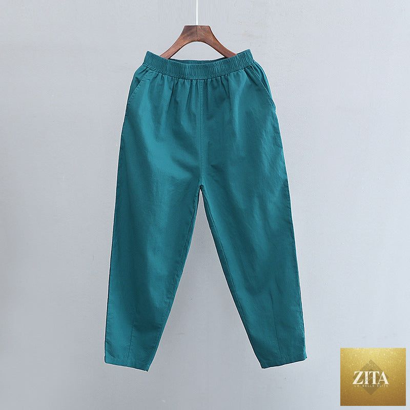 Light-colored cotton linen women’s casual cropped pants from Wanita Store, featuring a relaxed fit and artistic design for spring and summer.