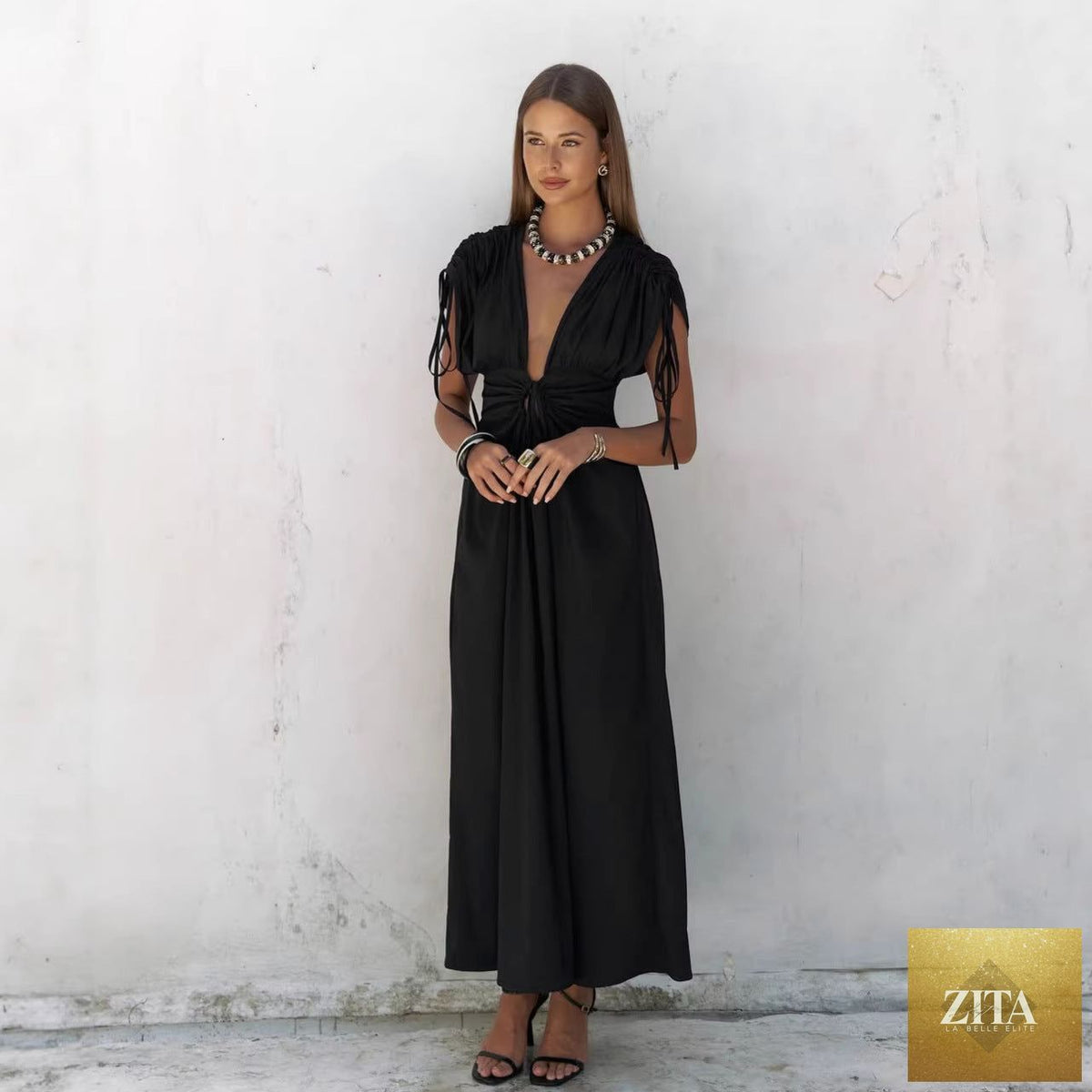 Summer elegant black backless sexy French dress by Bella Mia featuring deep V plunge, lace-up design, slim fit, short sleeves.